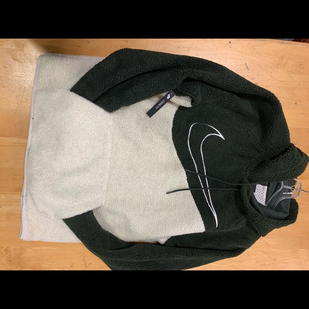 Nike hoodie size medium, dark green and white.